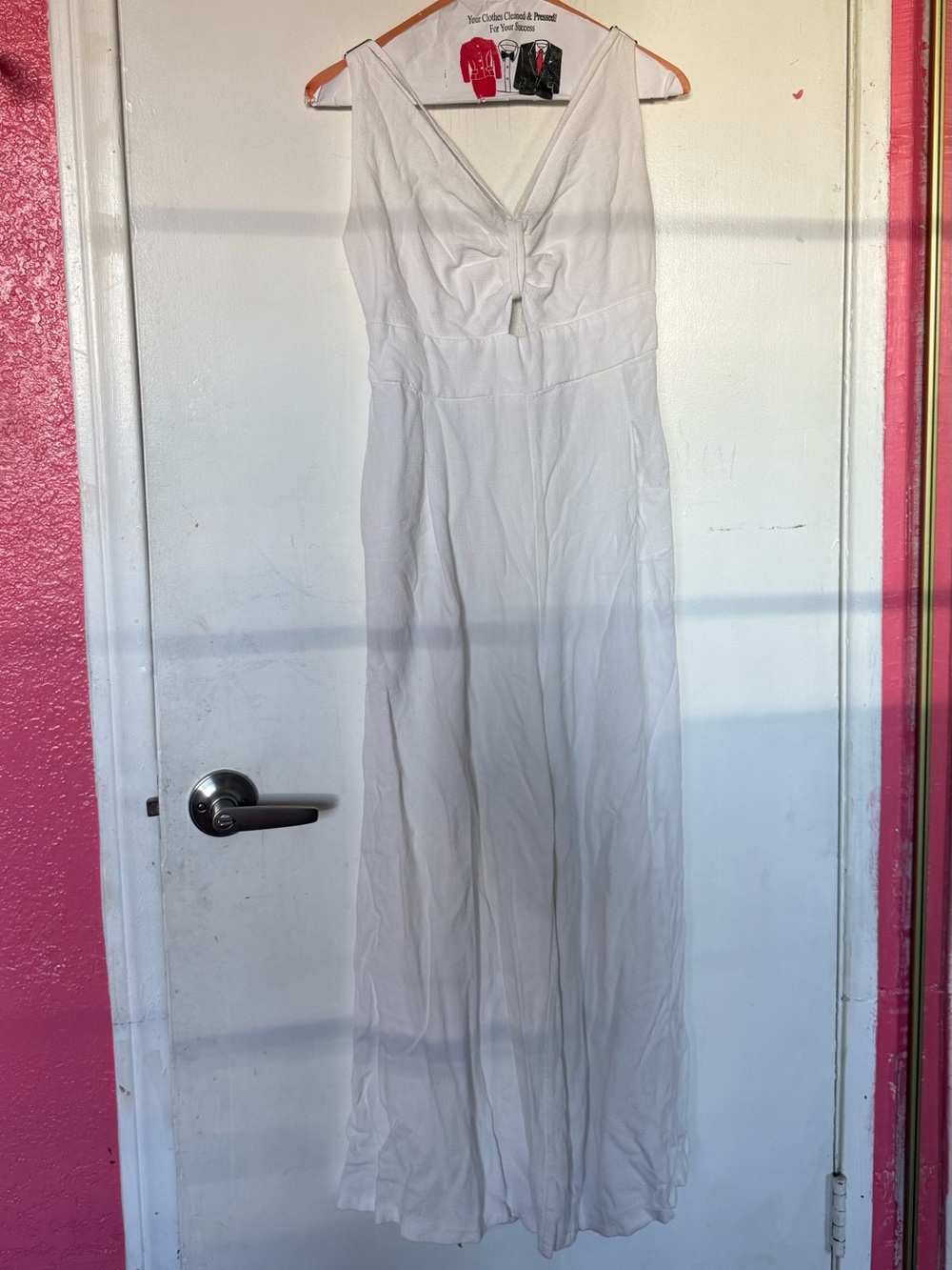 Sleeveless White V-Neck Tie-Front Wide-Leg Jumpsuit